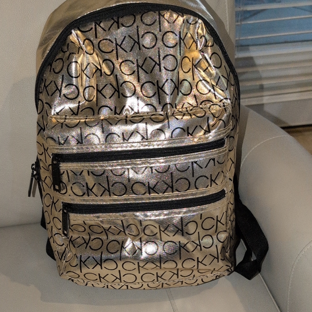 Calvin Klein Metallic Gold Backpack with Black Logo